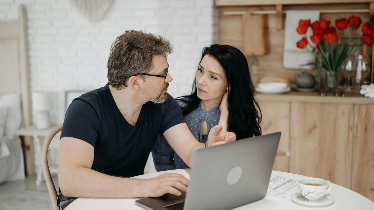 Homeowner experiencing financial hardship while researching mortgage forbearance